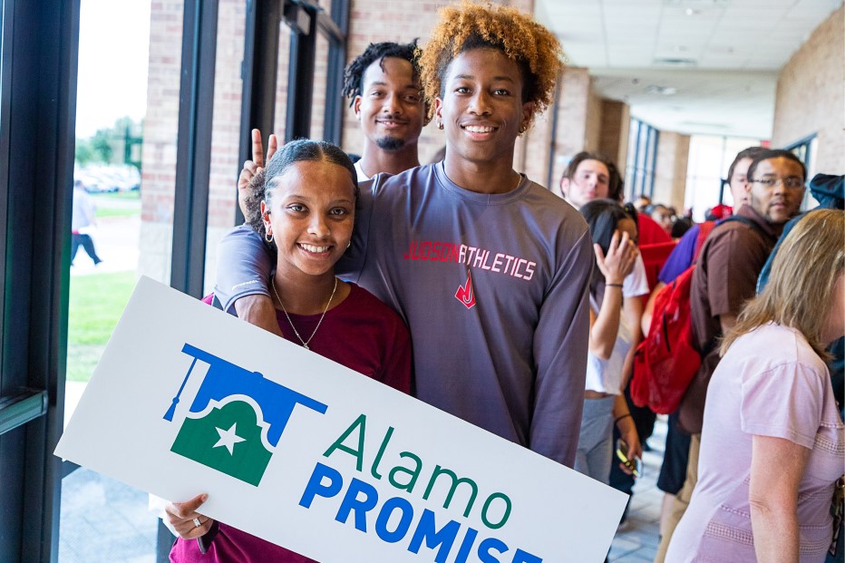 Three Judson Students Pose With AlamoPROMISE Sign