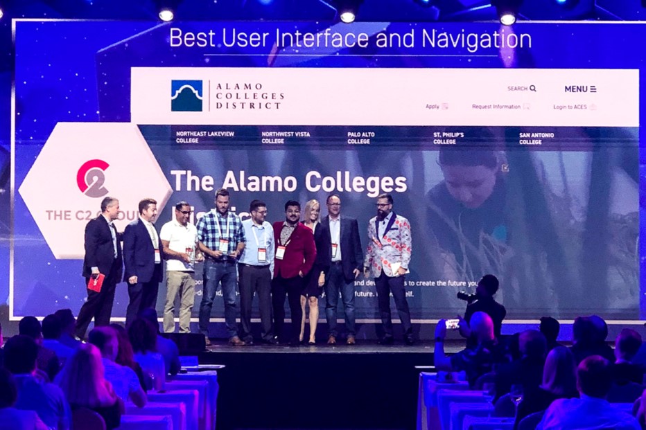 Alamo Colleges and C2 Accepting Award On Stage
